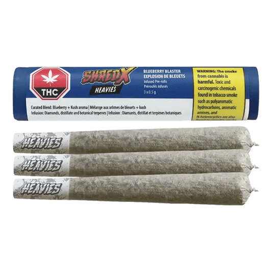 Front view of the Blueberry Blaster Heavies Infused Pre Rolled packaging with bold graphics and a warning label on a dark background.