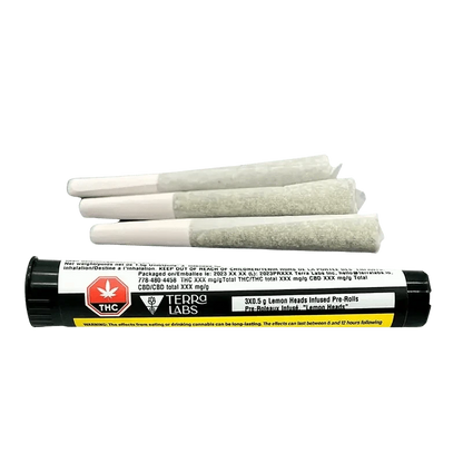Close-up of the Lemon Heads Live Resin Infused Pre Rolled 3 x 0.5 g packaging with bright label details against a dark background.