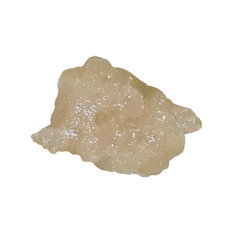 Close-up view of the Early Lemon Berry Fresh Frozen Hash Rosin with a textured, golden-brown surface and irregular edges.