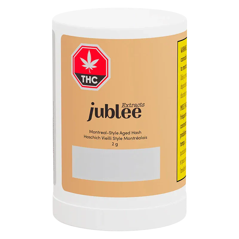 Front view of the Jubilee Extracts Montreal-Style Aged Hash white plastic jar with a tan label, THC emblem, and legible product text.
