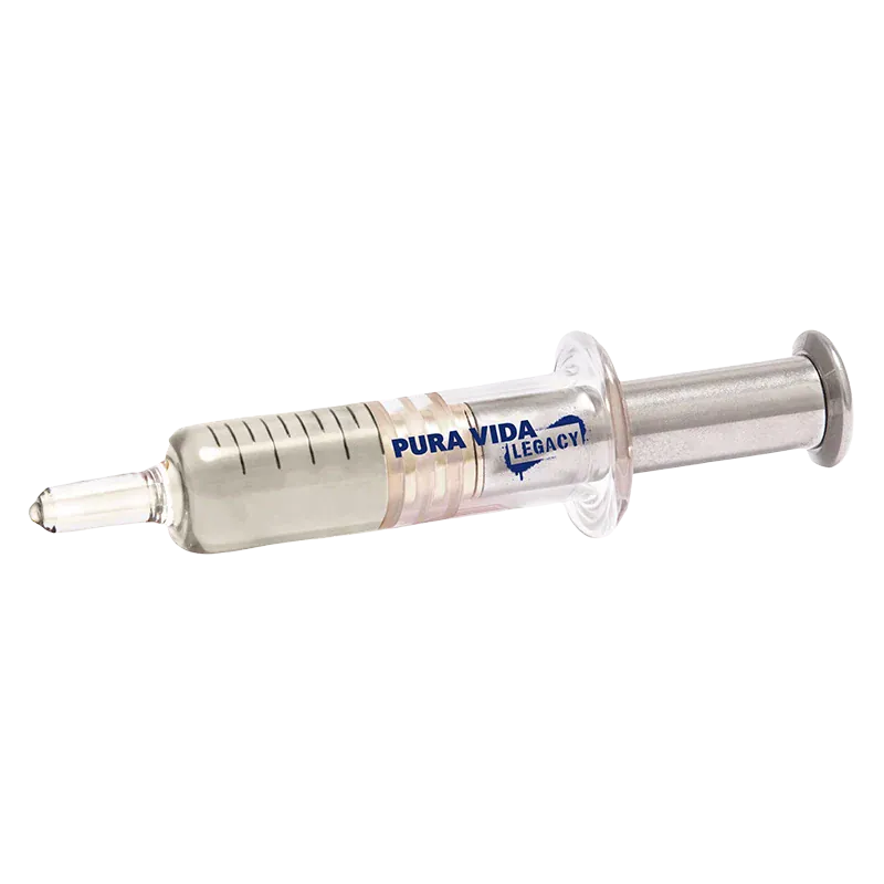 Angled close-up of a clear syringe-style dispenser labeled "Strawberry Gush Live Resin Jumbo Dispenser" lying on a white background.