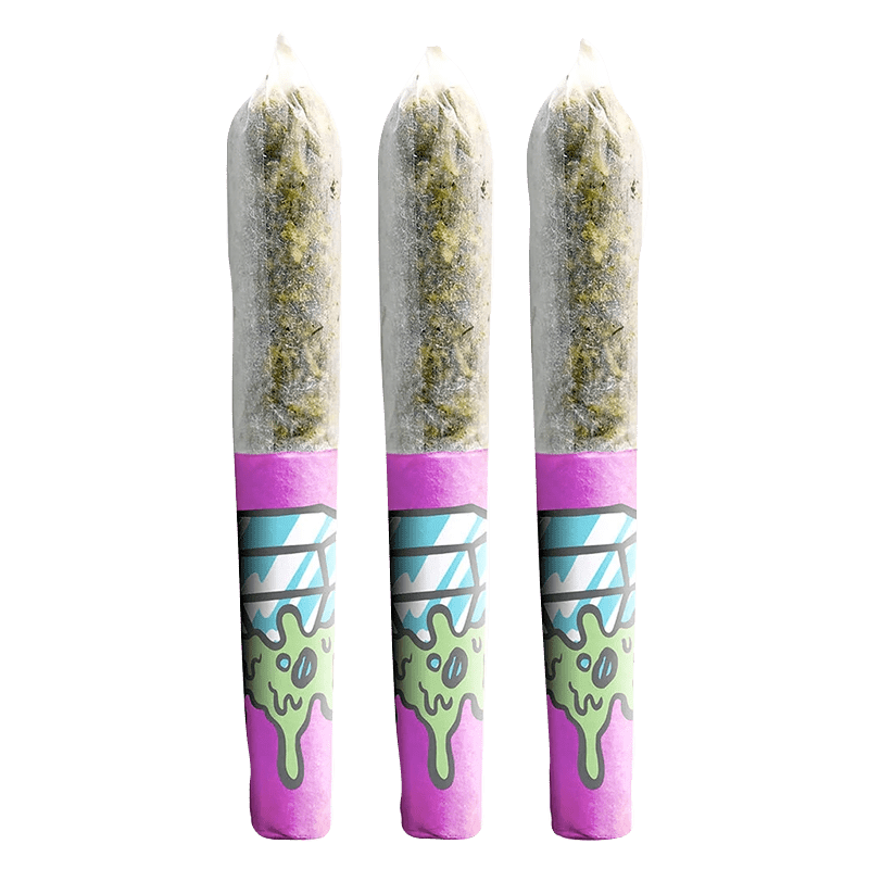 A slightly angled close-up of three Pearadise Dream Diamond Infused Pre Rolled 0.45g joints with vibrant green and purple detailing.