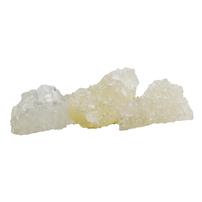 Close-up of crystallized Black Cherry Punch Diamonds with a translucent, jagged texture against a plain white background.