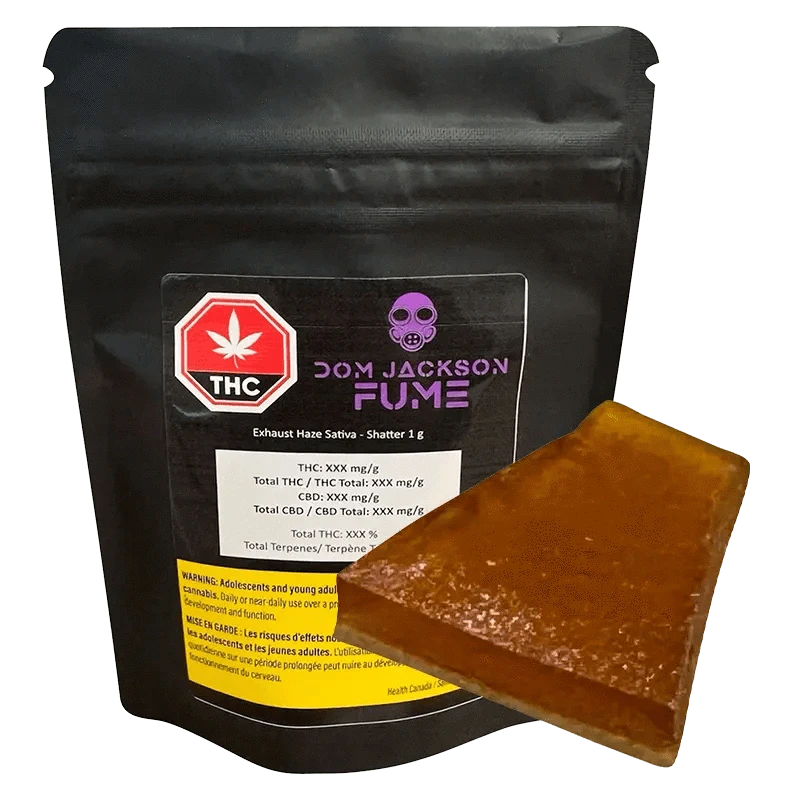 Close-up of the MAX Exhaust Haze Shatter packaging, displaying its label and branding against a black background.