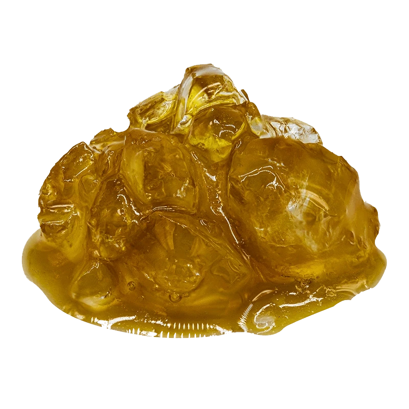 A close-up of the golden VVS Glazed Diamonds and Sauce with a glistening, textured surface.