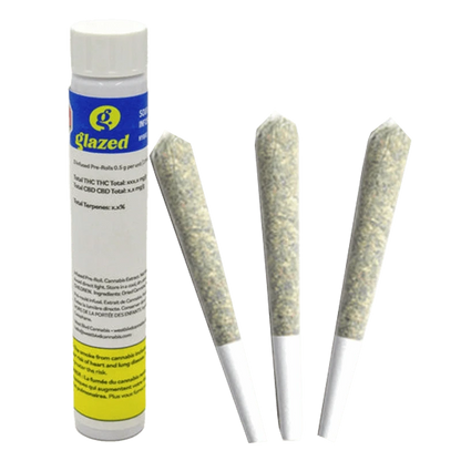 A close-up, angled view of three Sour Dubb Rosin Infused Pre Rolled 0.5 g rolls, showing their cylindrical shape and light brown color.