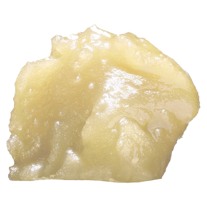 Close-up of the Naked Live Diamond Hash, showing a textured, golden-brown substance against a plain white background.