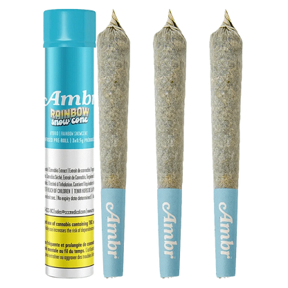 A close-up, angled view of the Rainbow Snowcone Infused Pre Rolled 3 x 0.5 g packaging, featuring colorful branding against a dark background.