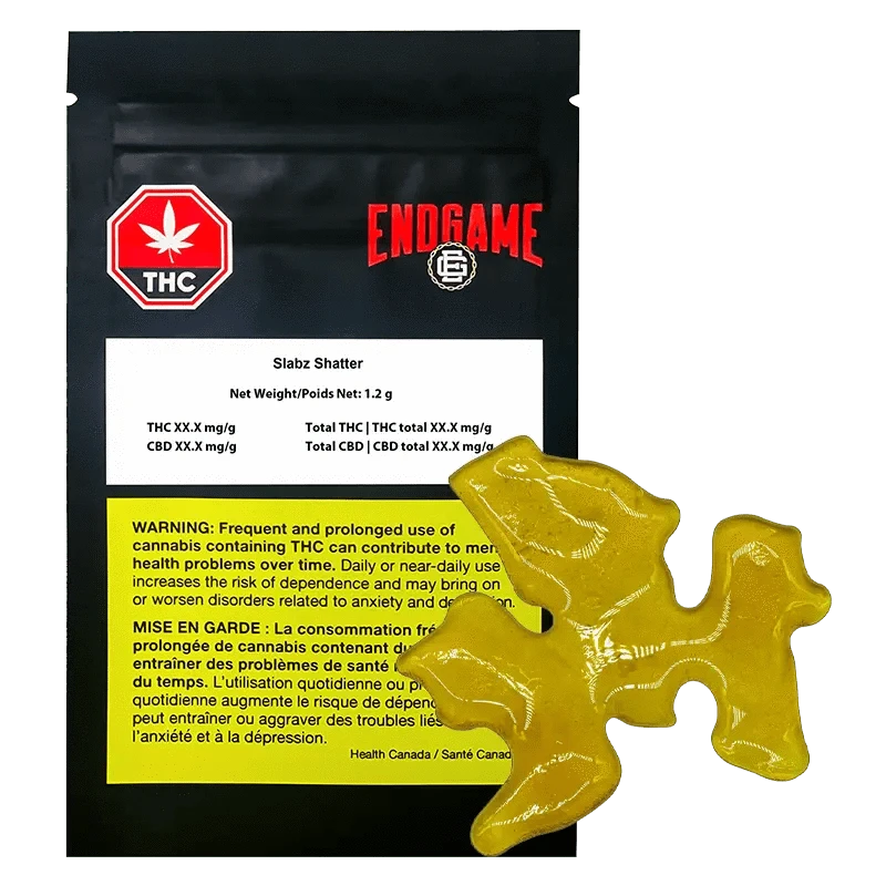 Front view of Endgame Slabz Shatter packaging with black and white branding, displaying THC content information.