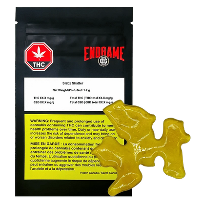 Front view of Endgame Slabz Shatter packaging with black and white branding, displaying THC content information.