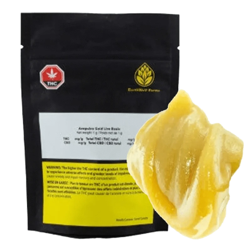 Close-up of the golden Acapulco Gold Live Rosin, showing its textured, amber-colored surface with a slightly translucent quality.