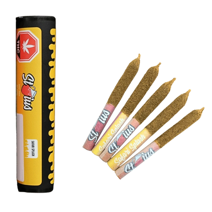 Angled view of five kief-coated Safari Splash Liquid Diamond Kief Coated Infused PR 5 x 0.25 g pre-rolls fanned beside their yellow and black cylindrical tube.