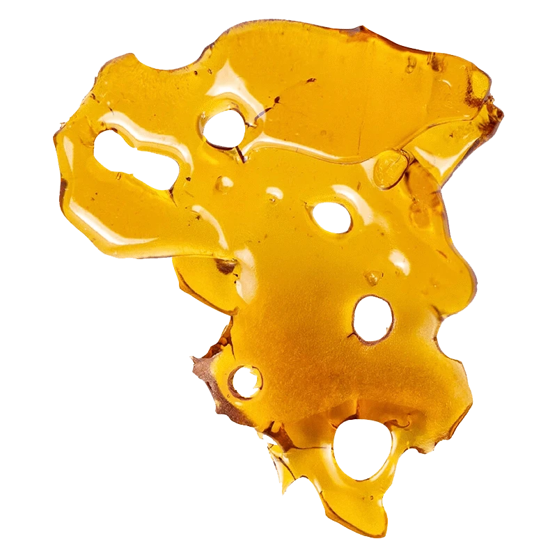 Top-down close-up of translucent amber GSC Shatter with irregular edges and several round holes against a plain background