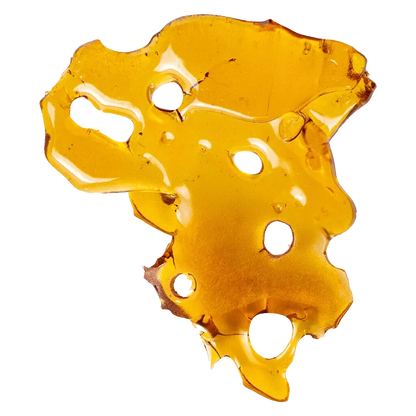 Top-down close-up of translucent amber GSC Shatter with irregular edges and several round holes against a plain background