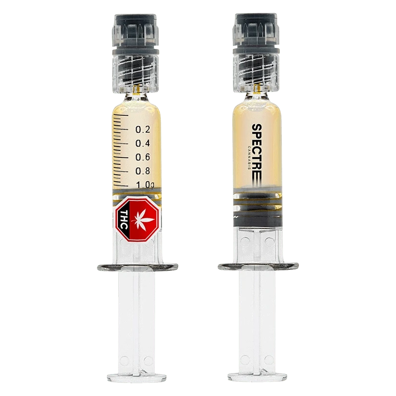 Front-facing pair of syringes filled with amber oil labeled "Operation Orange Liquid Diamond Dabber" against a plain white background.