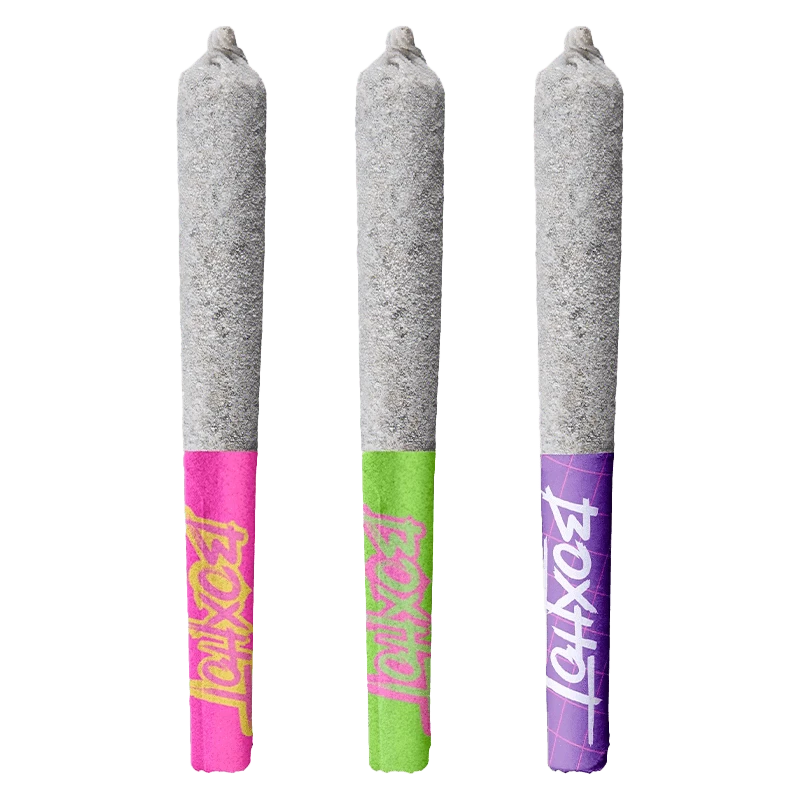 Three upright Diamond Doobies Trifecta Mixer Pack Infused PR 3 x 0.5 g pre-rolls with colorful pink, green, and purple branded tips against a white background.
