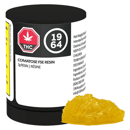 Angled front view of a black-lidded jar labeled Comatose FSE Resin with a glossy yellow resin mound beside it.