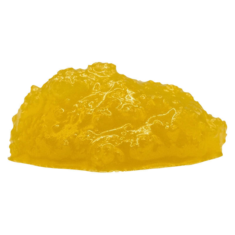 Close-up front view of a glossy yellow mound of Comatose FSE Resin against a plain background.