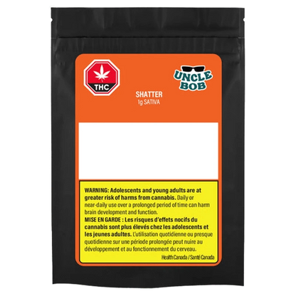 Front-facing shot of the black pouch packaging labeled "Uncle Bob Sativa Shatter" with an orange label, THC symbol, and yellow warning panel.