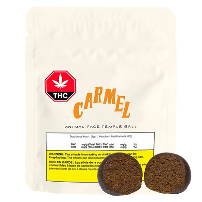 Front-facing pouch of Carmel Animal Face Temple Ball with a red THC symbol and two round brown temple balls shown at the base.
