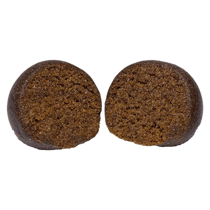 Close-up front view of two brown halves of an Animal Face Temple Ball set against a plain background.