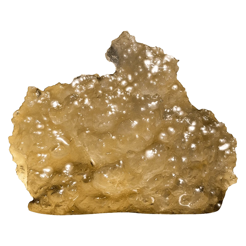 Close-up of a golden, translucent resin nugget photographed from the front, Liquid Imagination Live Resin glistening under studio lights.
