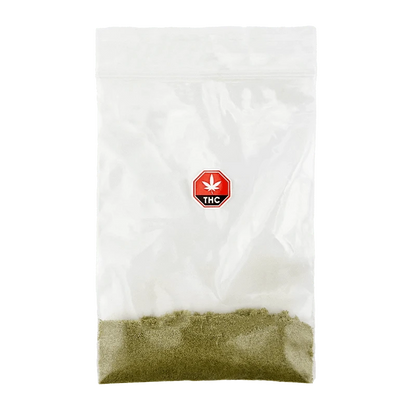 Clear front-facing photo of a zip-top bag labeled Galactic Glue Kief showing a thin layer of greenish kief against a white background and a small red THC emblem.