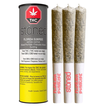 Front-facing shot of the Florida Sunrise Infused PR 3 x 0.5 g tube standing next to three rolled joints against a white background.