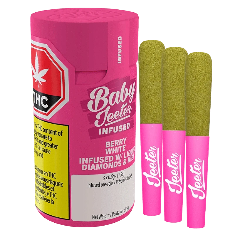 Three-quarter view of a bright pink Baby Jeeter Infused Berry White PR 3 x 0.5 g container beside three pink‑sleeved pre-rolls with greenish tops.