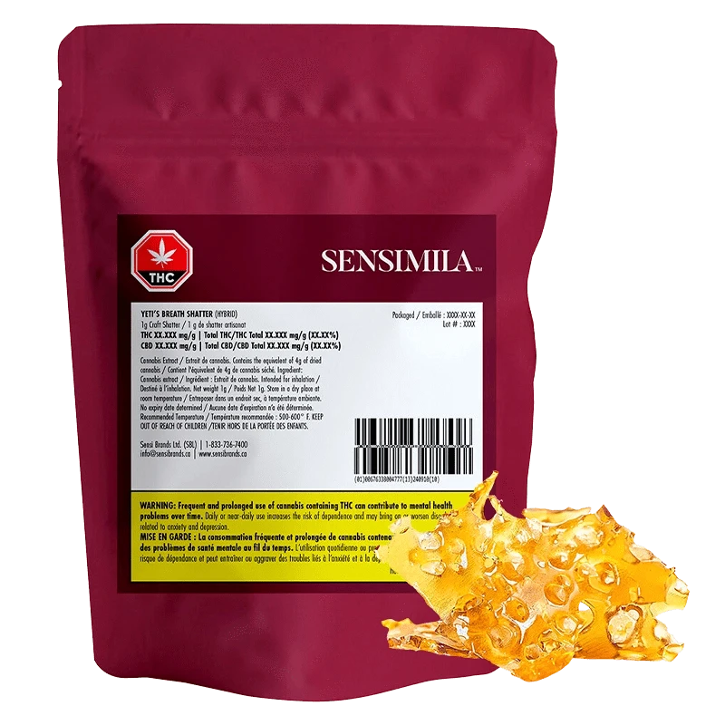 Front-facing shot of the Sensimila Yeti's Breath Shatter pouch in maroon with a white label and a golden amber shatter piece at the lower right.