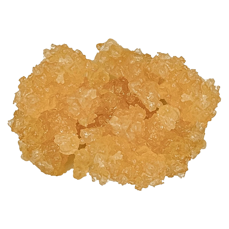 Top-down close-up of amber crystalline Porto Leche Live Resin showing glossy, irregular bead-like nuggets.