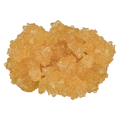 Top-down close-up of amber crystalline Porto Leche Live Resin showing glossy, irregular bead-like nuggets.