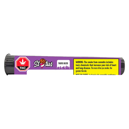 Close-up of the purple Status Tigers Bleed Liquid Diamond Infused kief coated PR 1 x 1 g tube label with THC symbol and yellow warning box.