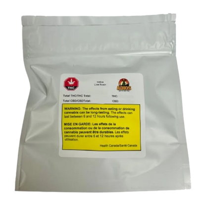 Front-facing shot of a silver resealable pouch labeled "Goldie Knox Jar Live Rosin" with a white sticker and prominent yellow warning box.