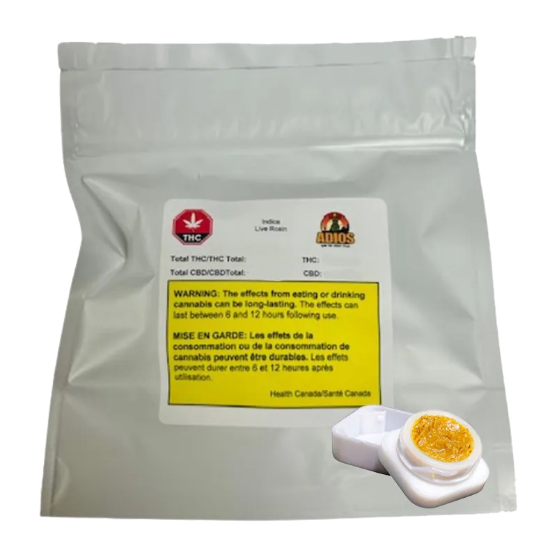 Front-facing shot of Goldie Knox Jar Live Rosin in a silver foil pouch with warning label and a small open white jar of amber concentrate.