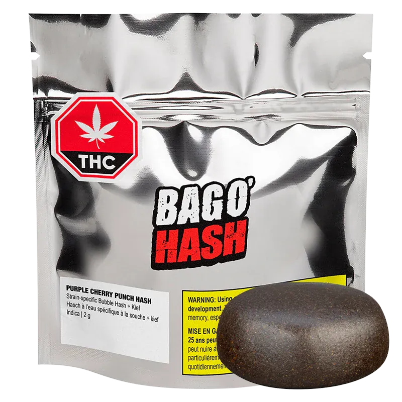 Front view of a silver pouch labeled "BAGO' HASH Purple Cherry Punch Hash" with a round dark hash resin puck displayed on the right.