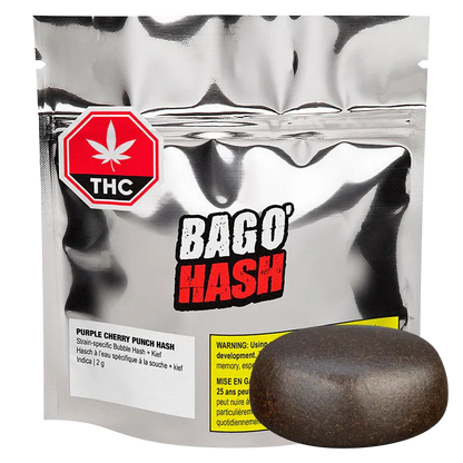 Front view of a silver pouch labeled "BAGO' HASH Purple Cherry Punch Hash" with a round dark hash resin puck displayed on the right.