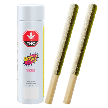 Two angled Wtf Slimsicles Infused PR 2 x 0.5 g slim pre-rolls coated in sugar beside their white cylindrical branded tube against a white background.