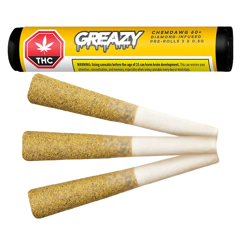 Angled top-down view of three coated pre-rolls beside a yellow tube labeled "Chemdawg 60+ Double Infused PR 3 x 0.5 g."