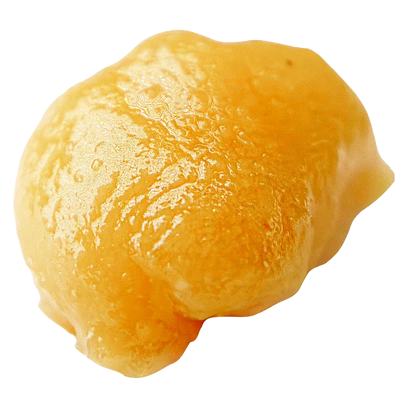 Close-up, top-down view of a glossy golden lump of concentrate labeled High Noon Reserve Live Resin.