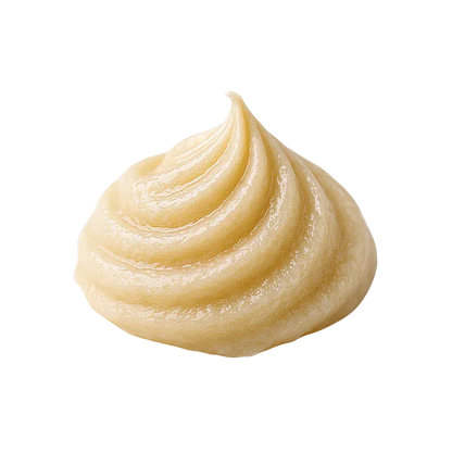 Close-up of a glossy pale yellow cream swirl of Sherbet Queen Live Whipped Diamonds on a white background