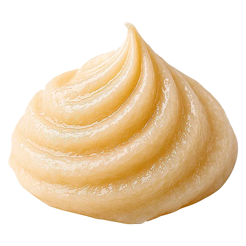 Close-up of a glossy beige cream swirl, BC Green CRK Live Whipped Diamonds shown from a low front angle on a white background