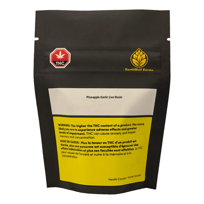 Front view of a black pouch labeled EarthWolf Farms Pineapple Garlic Live Rosin with a white label and yellow THC warning block.