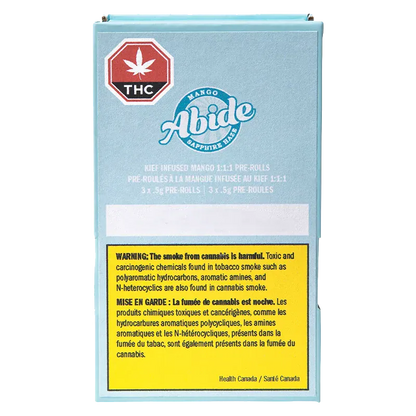 Front-facing view of the pale blue box labeled "CBG Infused Mango PR 3 x 0.5 g" with an Abide logo, THC symbol, and a yellow health warning panel.