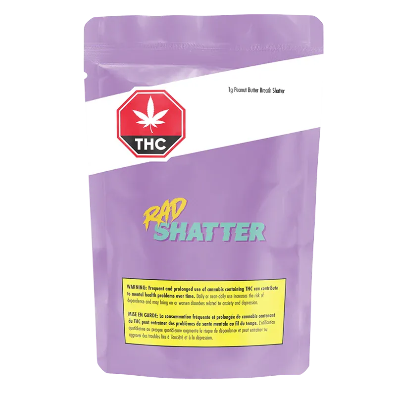 Front-facing shot of the purple pouch labeled Peanut Butter Breath Shatter with a red THC stop sign and "RAD SHATTER" logo.