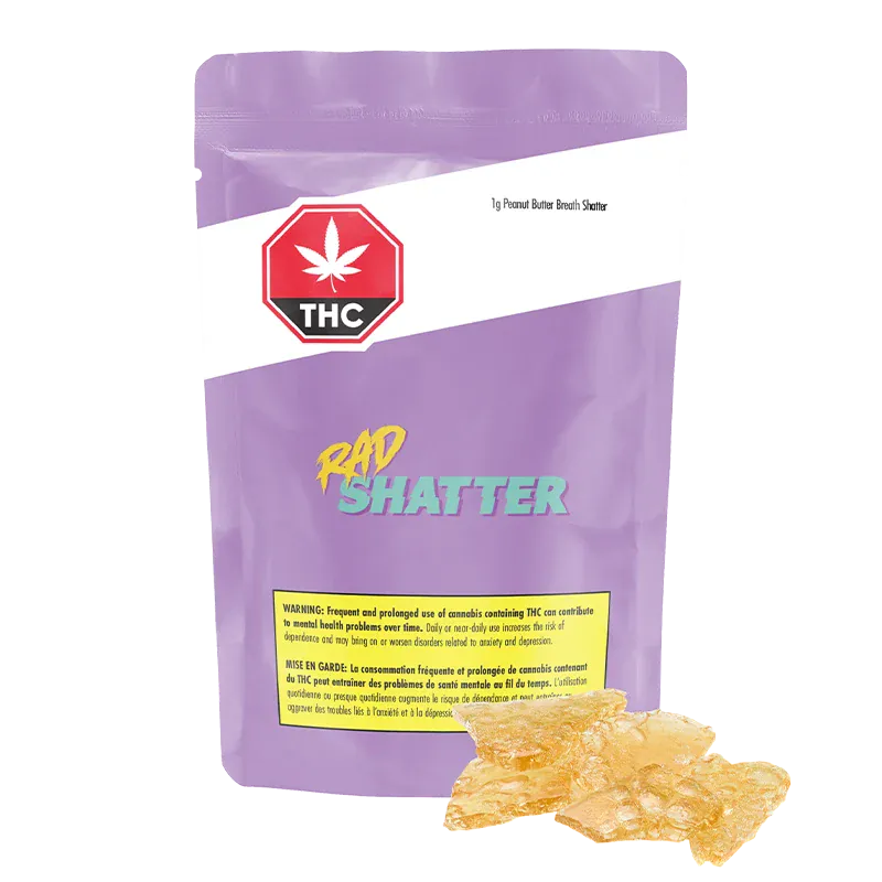Front-view of a purple pouch labeled "Peanut Butter Breath Shatter" with teal "RAD SHATTER" text and amber shatter pieces at its base.