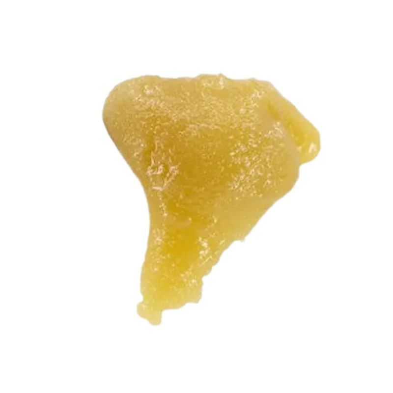 Close-up top-down view of a golden, irregular scoop of Banjo Cold Cure Live Rosin against a plain white background.