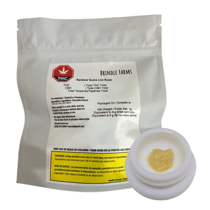 A front-facing shot of Brindle Farms Rainbow Guava Live Rosin pouch and a small white jar with pale yellow rosin inside, on a white background