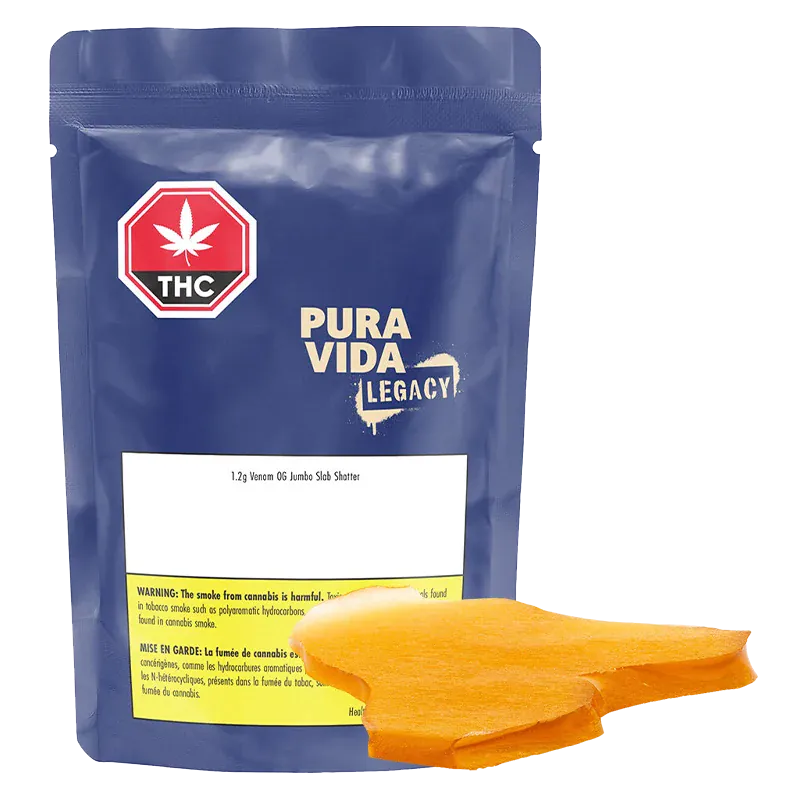 Front-facing shot of a blue pouch labeled Pura Vida Legacy with bright orange Venom OG Jumbo Slab Shatter pieces in the foreground.