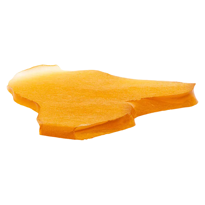 Angled close-up of a rich amber-orange slab of Venom OG Jumbo Slab Shatter showing smooth surface texture and a slightly beveled edge